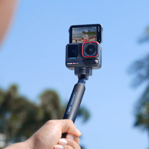 Handheld support arrangement with a separate camera and selfie stick