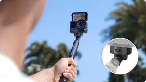 Manufacturer example of the quick-release adapter on a handheld camera support