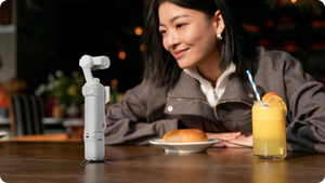 Insta360 Luna Series Battery Handle manufacturer cafe filming example with a separate camera
