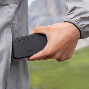 Insta360 X6 Fast Charge Case charging case being carried in a pocket