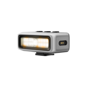 Insta360 Ace Pro 2 2-in-1 Flash and Fill Light angled view of the illuminated flash and fill light