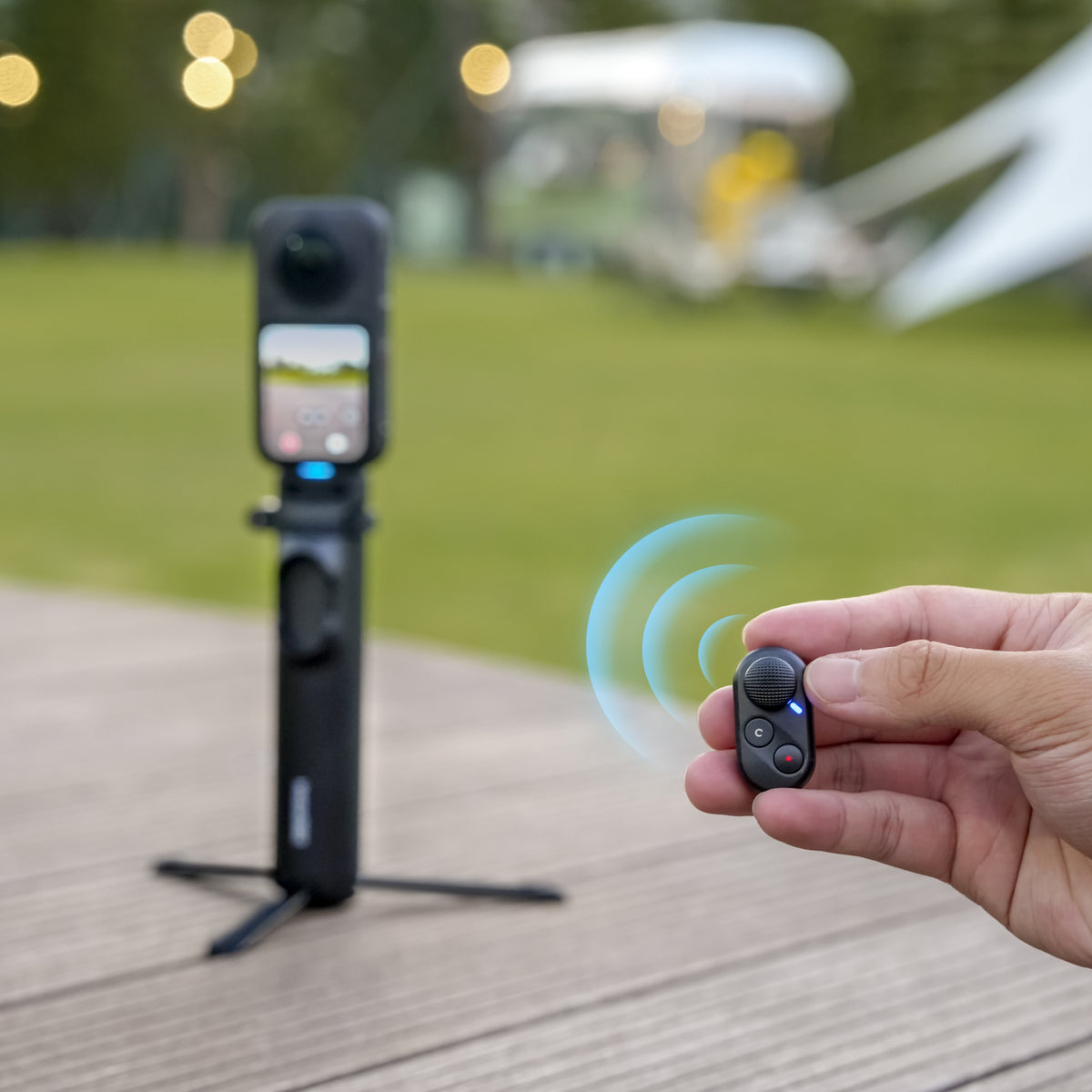 Wireless filming control demonstrated with a separate camera and tripod