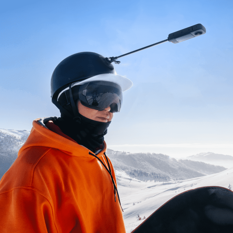 Helmet extension rod used during a snow-sport recording