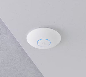 Ubiquiti U7-Pro ceiling installation on a plain surface