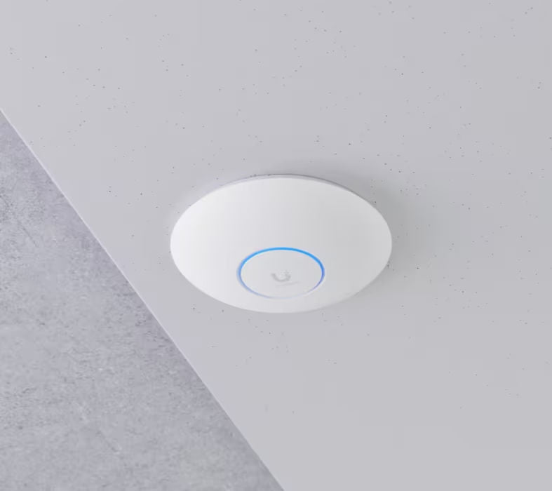 Ubiquiti U7-Pro ceiling installation on a plain surface